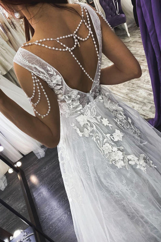 Elegant V-neck Backless A-line Bridal Gown Featuring Pearl Appliques