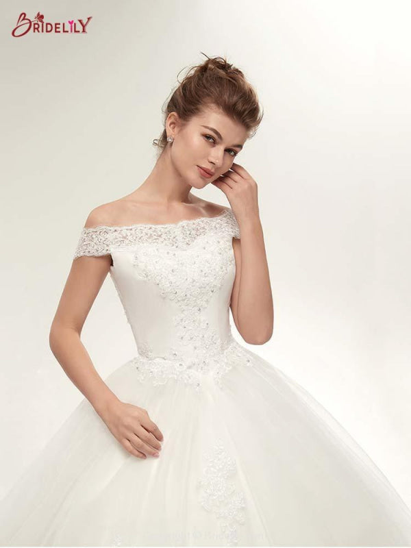 Elegant Lace-up Appliques Ball Gown Wedding Dresses
