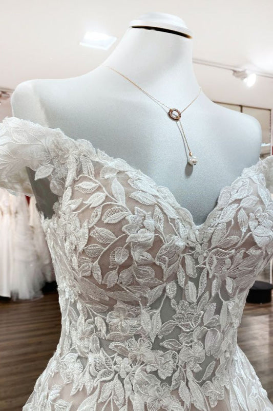 Elegant Off-the-shoulder A-line Wedding Dress Featuring Ruffles and Tulle Lace