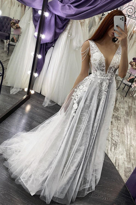 Elegant V-neck Backless A-line Bridal Gown Featuring Pearl Appliques