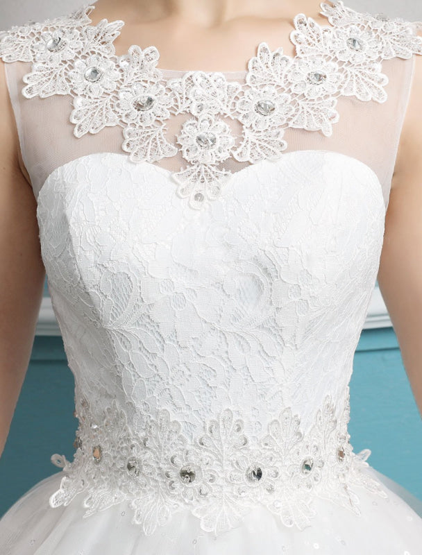 Princess Ball Gown Wedding Dresses Tulle Backless Ivory Beading Floor Length Bridal Dress